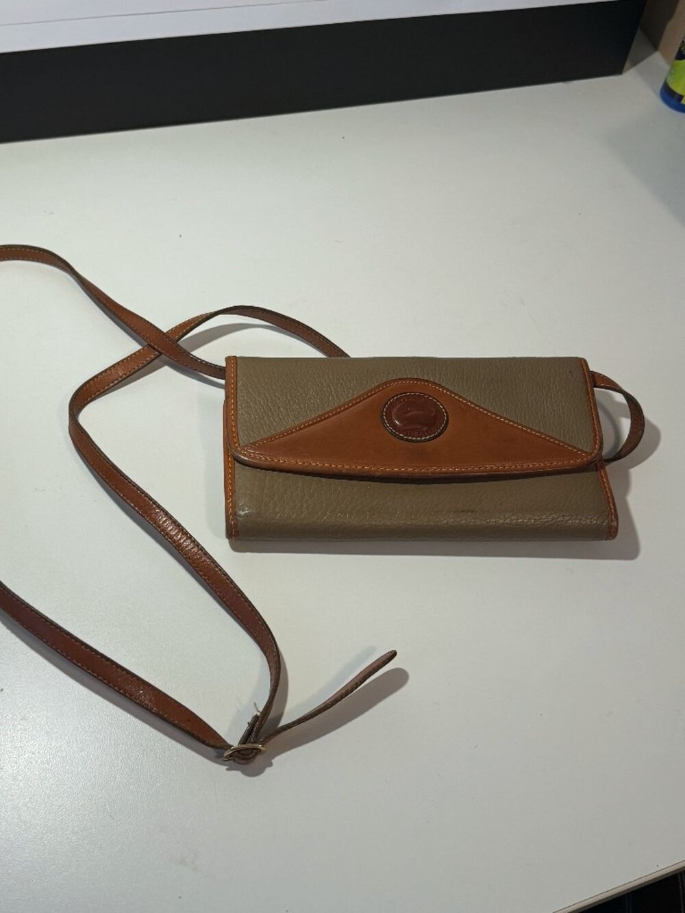 Dooney & Bourke Brown and Tan Leather Adjustable Strap Bag